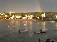 El arcoiris anuncia el final de una espectacular tormenta de verano, Riels, La Escala, Costa Brava